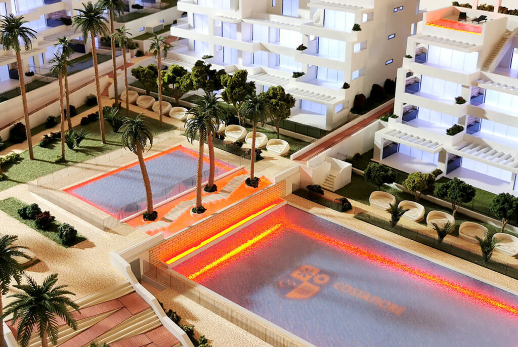 maqueta interactiva promoción inmobiliaria con piscinas